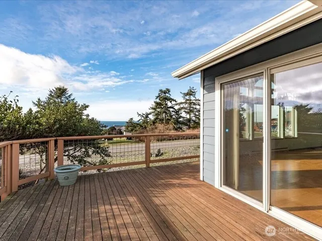 a view of balcony with couch and wooden floor