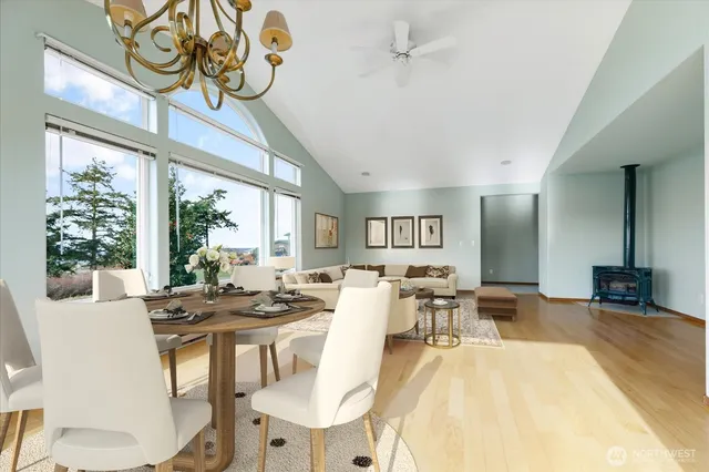 a view of a dining room with furniture window and outside view