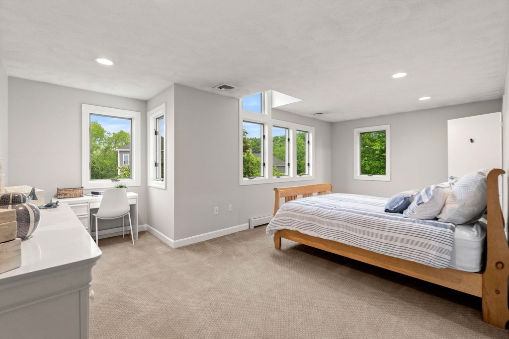 53 Gerald Road Marblehead, MA 01945 - Photo 23 of 42 a bedroom with a bed and a couch