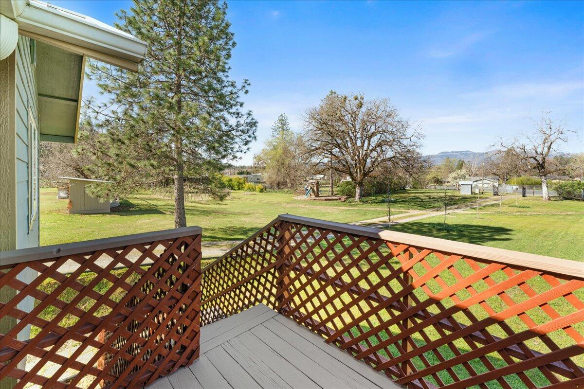 649 Pleasant Valley Road Merlin, OR 97532 - Photo 22 of 57 a view of wooden deck with a yard