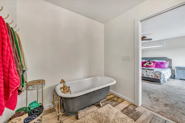 a kitchen with cabinets and window