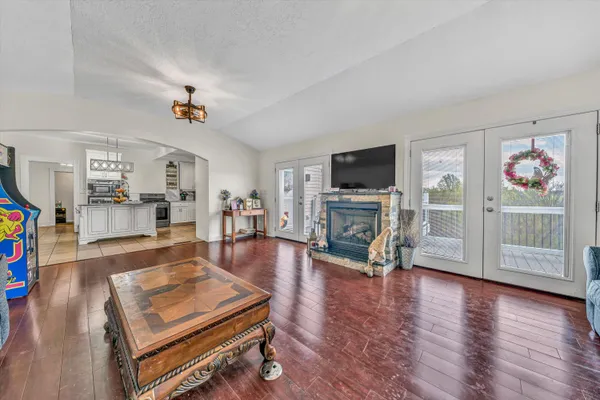 a kitchen with stainless steel appliances a refrigerator and a stove top oven