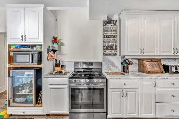 a bedroom with a bunk bed and a dresser