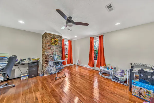 a kitchen with stainless steel appliances granite countertop a stove and a refrigerator