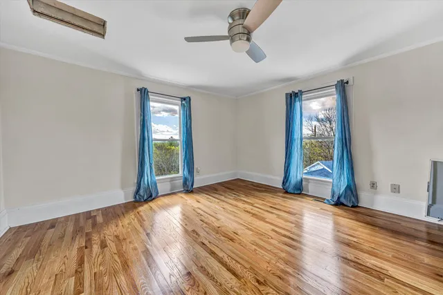 a view of a balcony with chairs