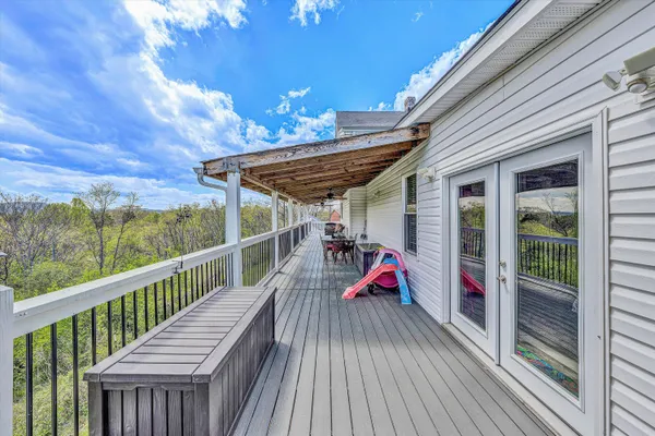 a view of swimming pool with seating space