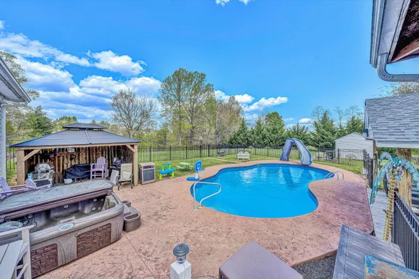 a view of a park with a slide