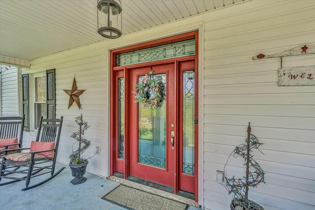 a view of entryway with wooden floor
