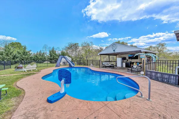 a view of a balcony with furniture