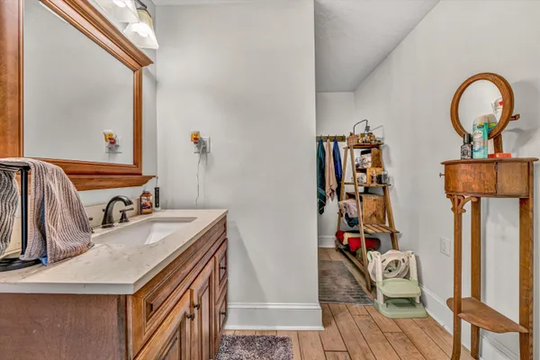 a bed room with a bed and a television