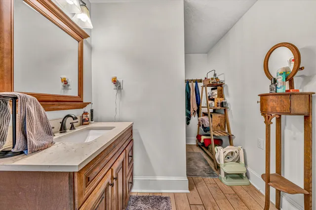 a bed room with a bed and a television