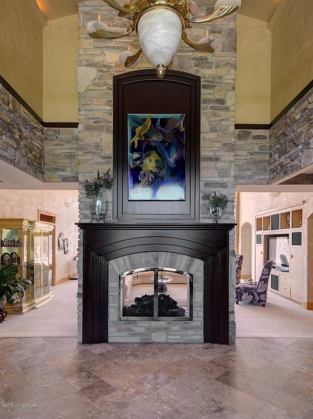 See Through Fireplace into Great Room