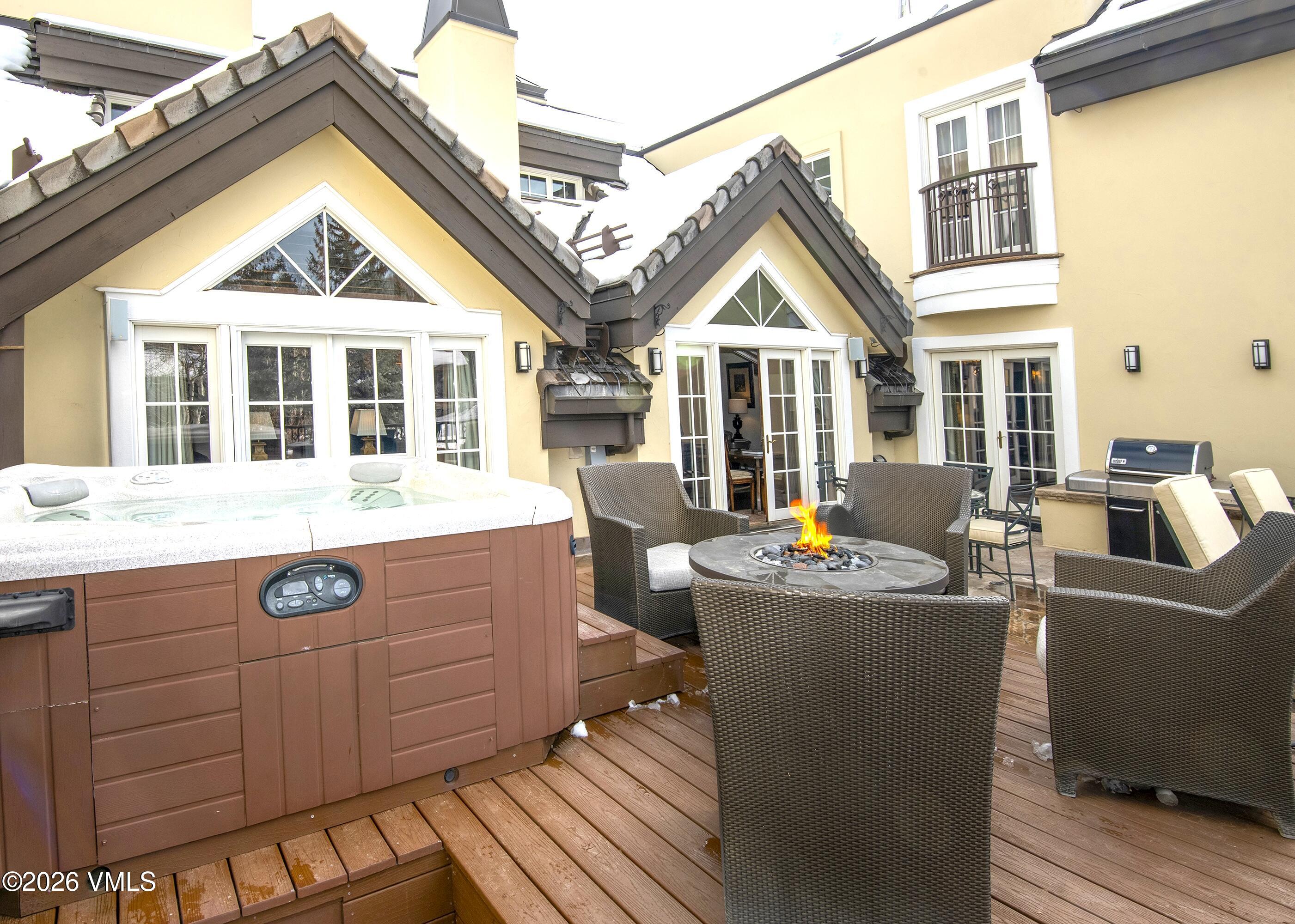 458 Vail Valley Drive, Unit R5 Vail, CO 81657 - Photo 35 of 39 Deck with Hot Tub