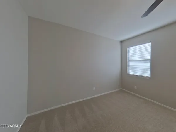 a kitchen with sink stove microwave and refrigerator