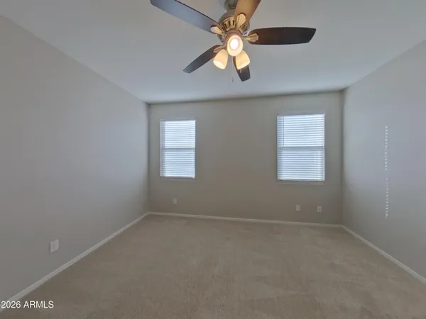 an empty room that has a window
