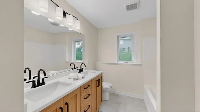 $549,900 | 6119 Cody Lane Northwest, Rochester, MN 55901