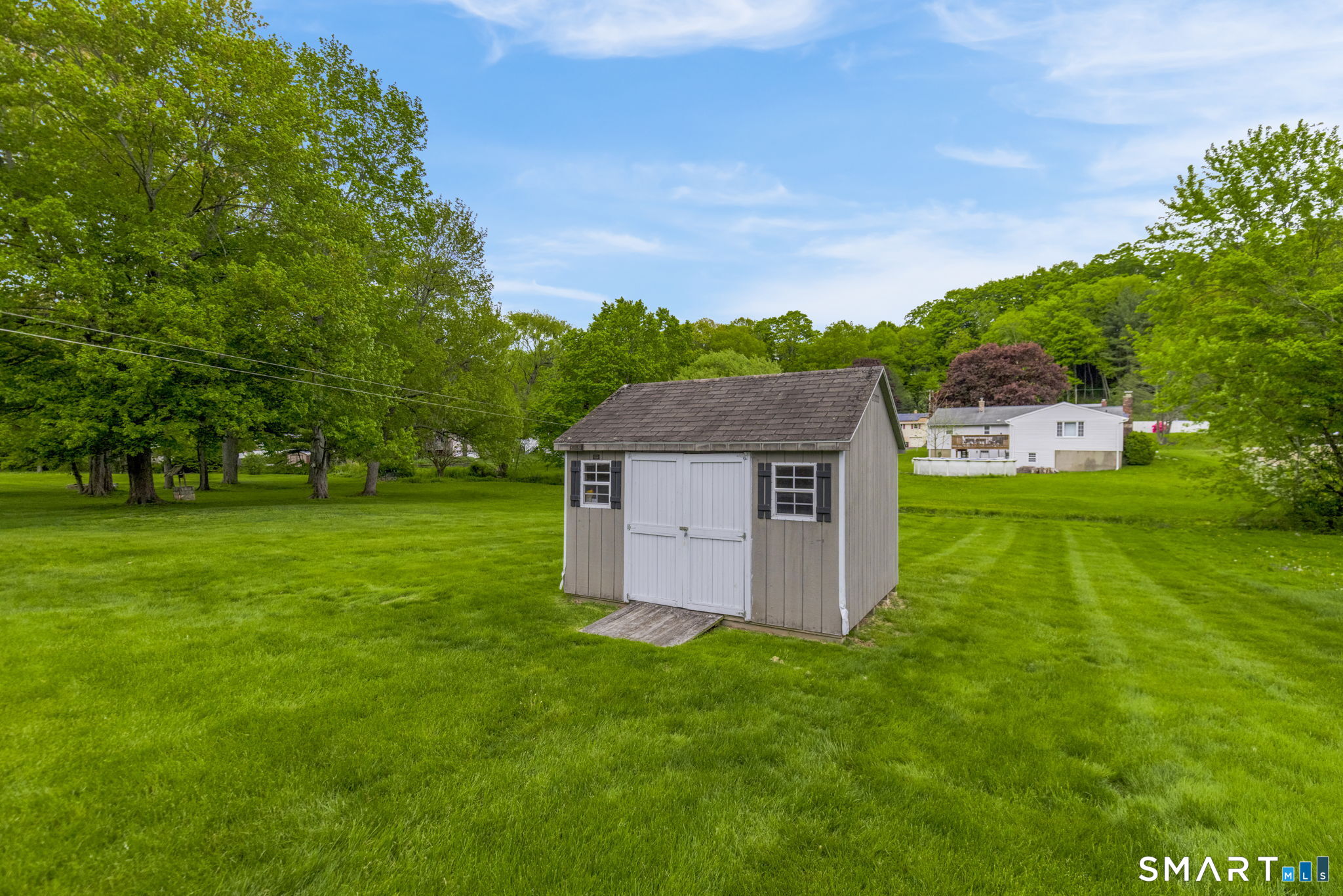 102 Wayne Lane Meriden, CT 06450 - Photo 33 of 36 a aerial view of a house with a yard