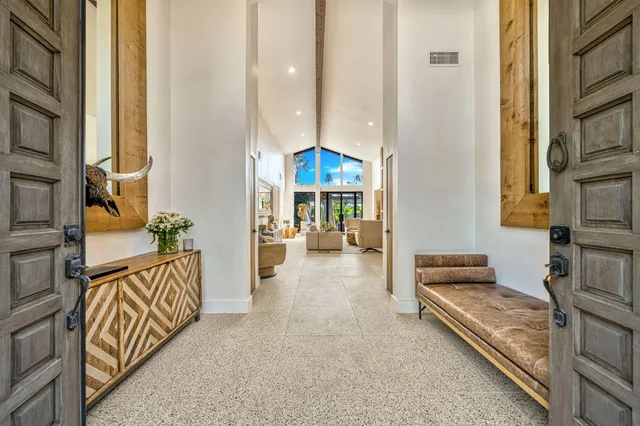 a view of a hallway with couch