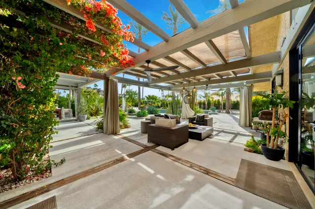 a view of a swimming pool with a patio