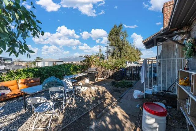 a bedroom with bed and a window