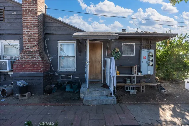 a kitchen with a stove and a refrigerator