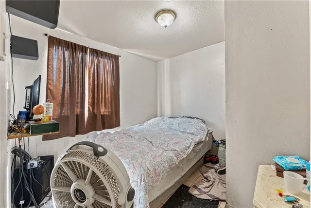 an aerial view of residential houses and outdoor space