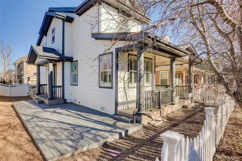a view of a house with a snow on the road