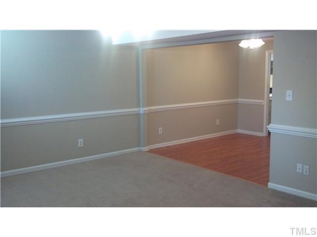 6511 New Market Way Raleigh, NC 27615 - Photo 2 of 8 Large family room lookin into dining