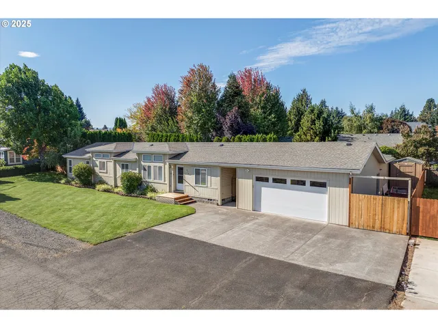 a house view with a garden space