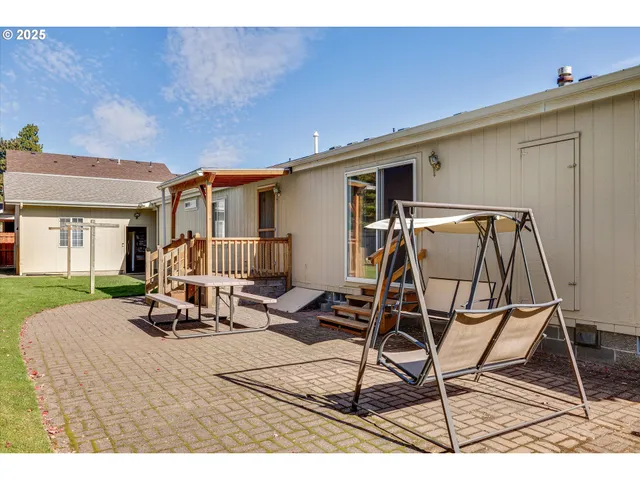 a view of a chairs and tables in patio