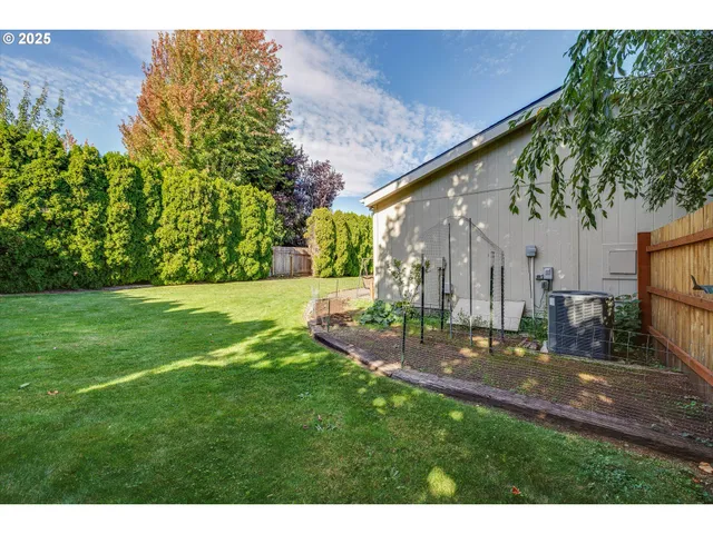 a garden view with a outdoor space