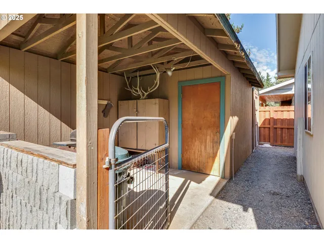 a view of balcony with wooden floor