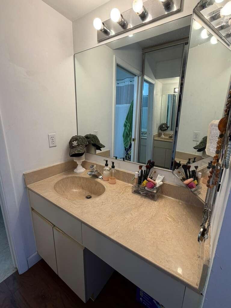 8182 Thames Boulevard, Unit D Boca Raton, FL 33433 - Photo 14 of 20 a bathroom with a sink double vanity