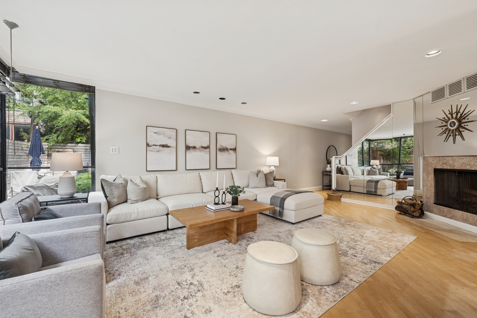 524 West Barry Avenue Chicago, IL 60657 - Photo 4 of 39 a living room with furniture a fireplace and a large window