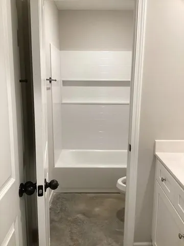 a bathroom with a bathtub