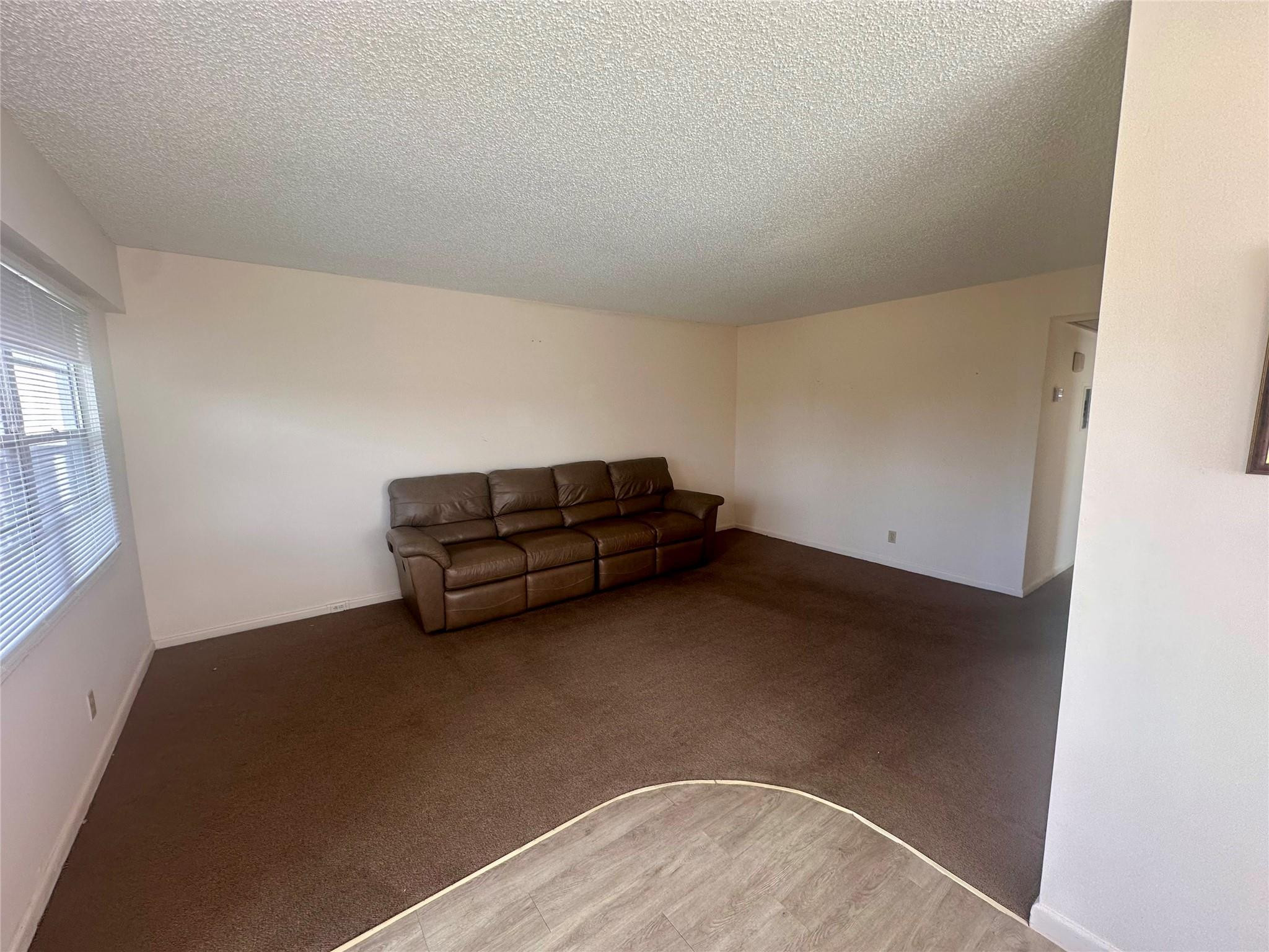 29 Preston A Boca Raton, FL 33434 - Photo 9 of 21 a view of room with window and stairs