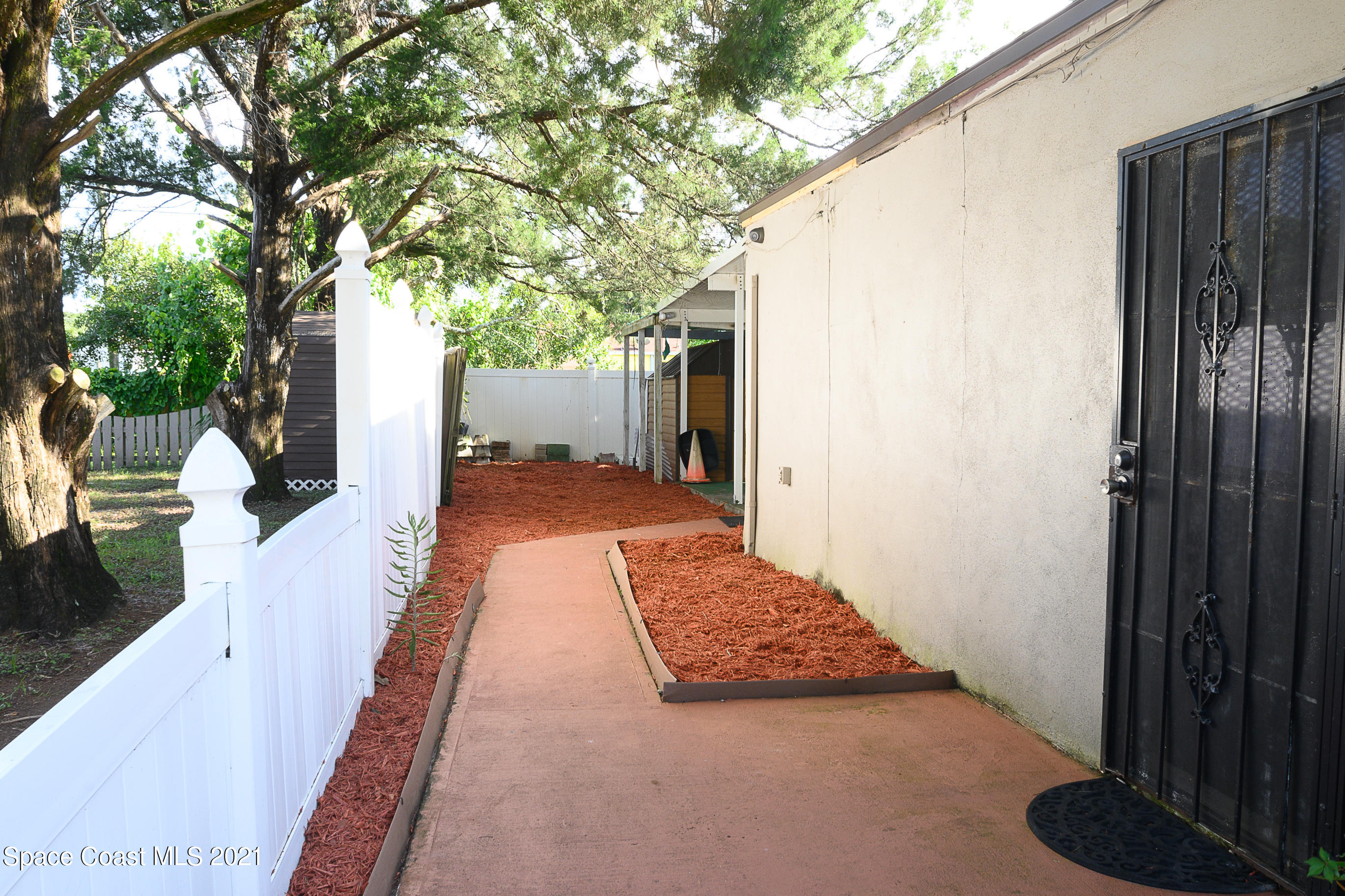 1003 Bernice Road Rockledge, FL 32955 - Photo 41 of 43 a view of a house with backyard