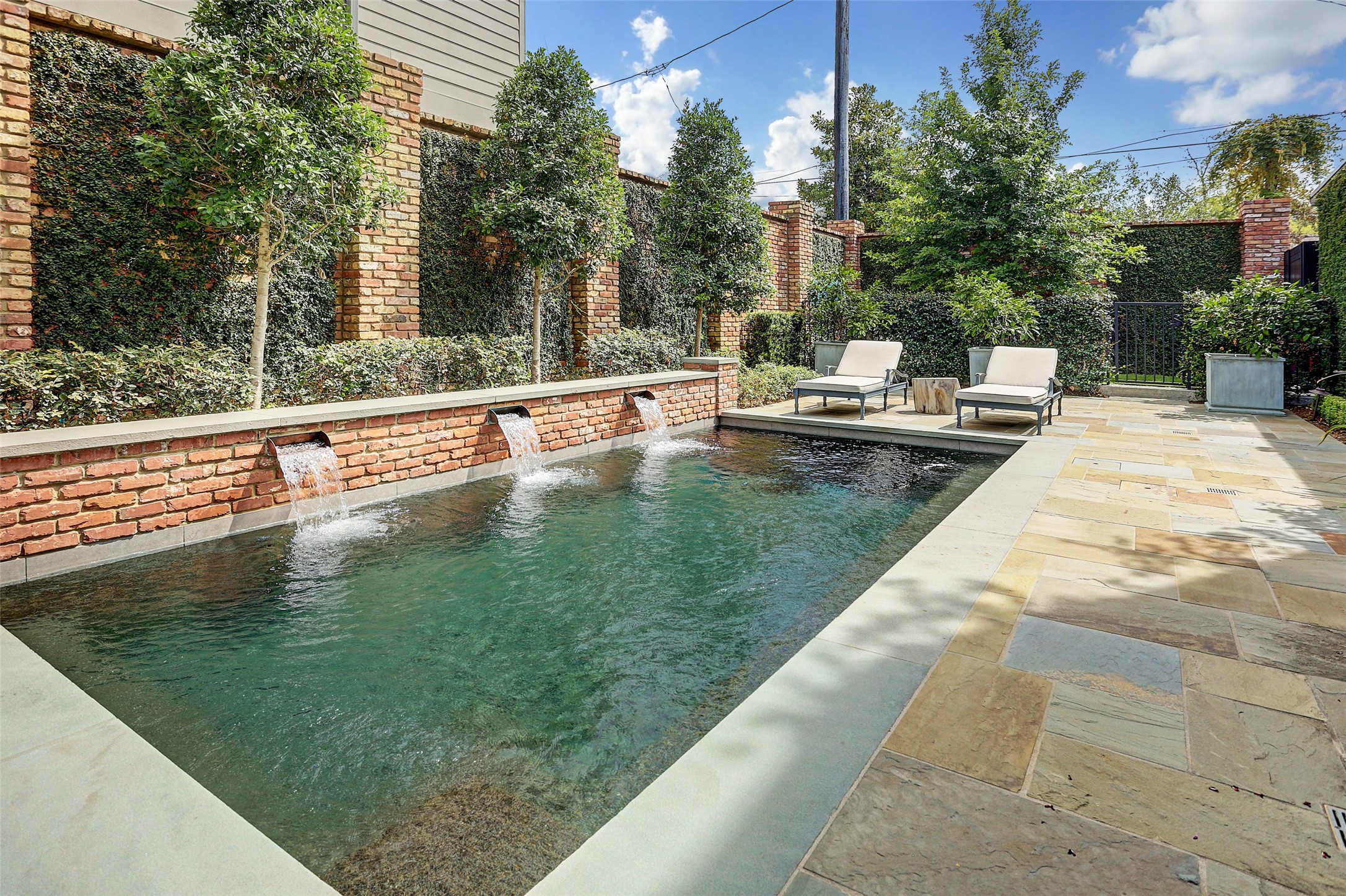 808 Coronado Street Houston, TX 77009 - Photo 48 of 50 Unit 2, spacious backyard with private pool, surrounding patio, and lush landscaping.