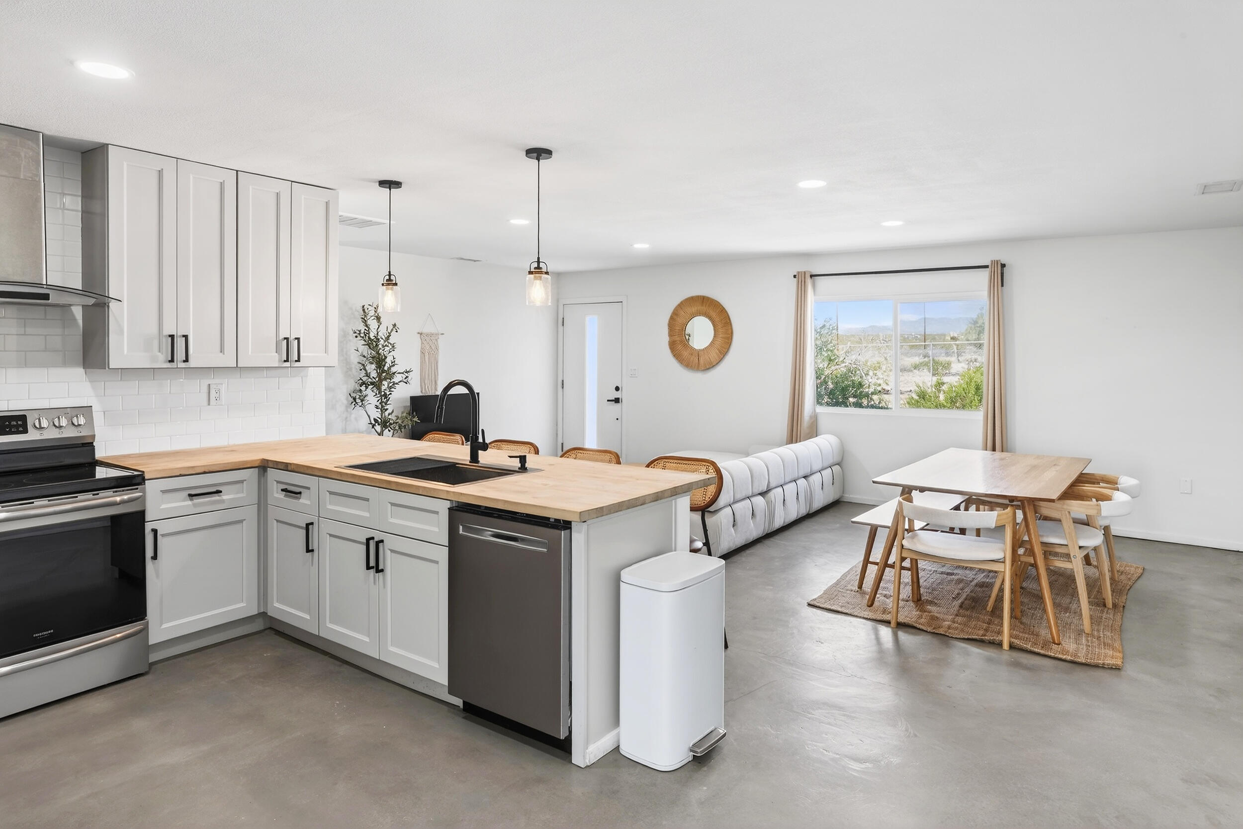 2071 Border Avenue Joshua Tree, CA 92252 - Photo 16 of 50 a kitchen with a sink and a stove top oven