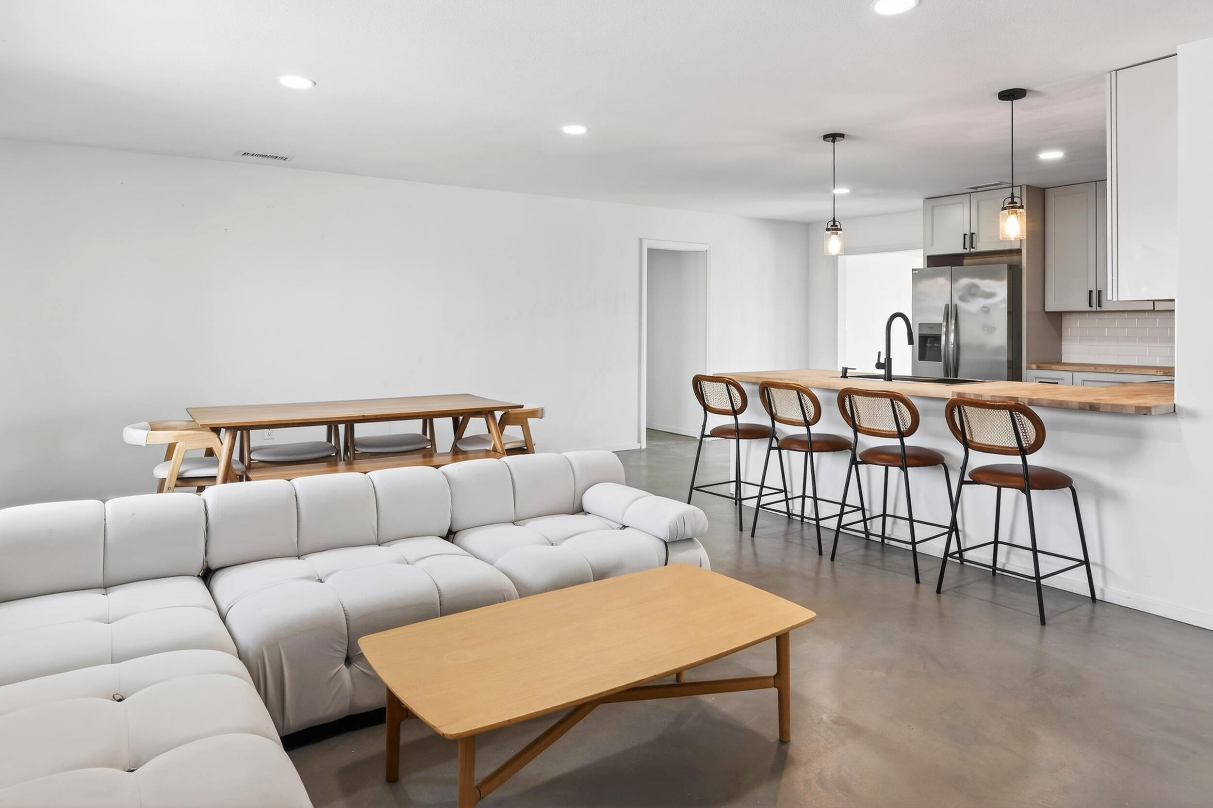 2071 Border Avenue Joshua Tree, CA 92252 - Photo 18 of 50 a living room with furniture and kitchen view