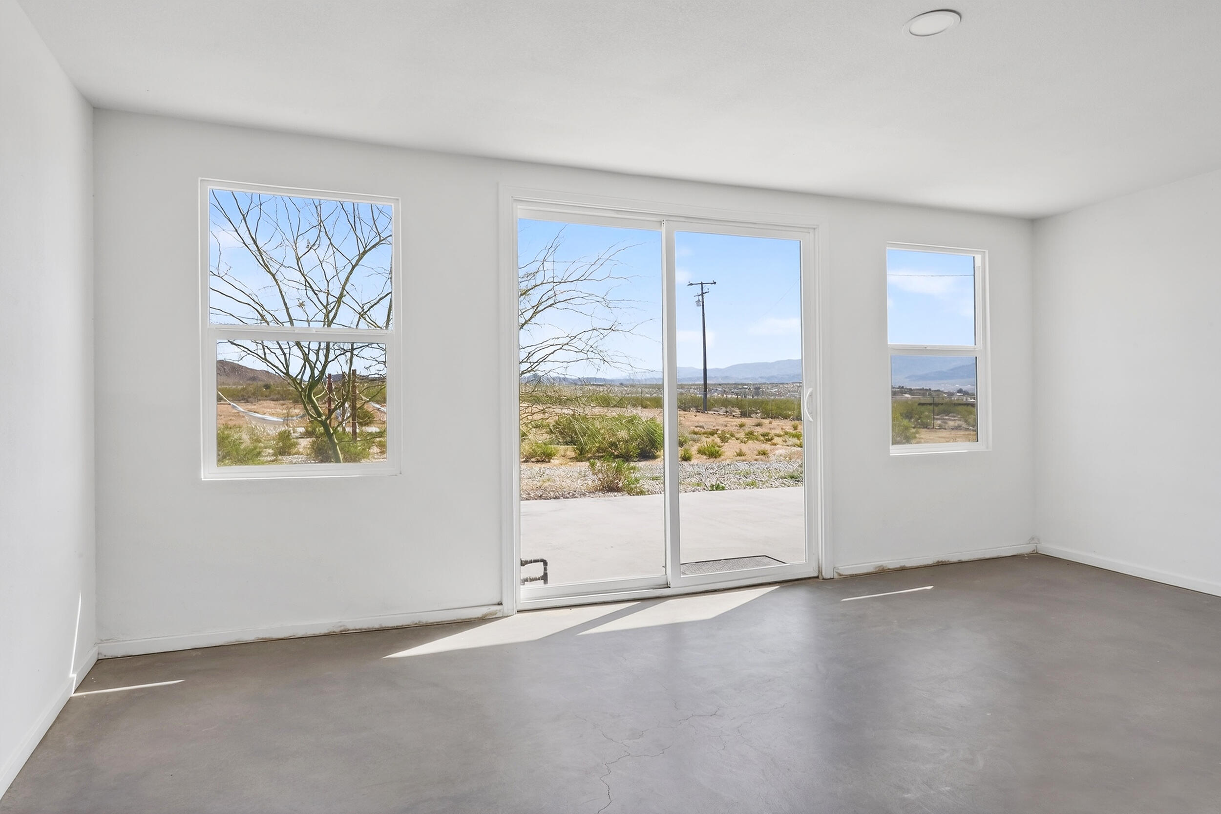 2071 Border Avenue Joshua Tree, CA 92252 - Photo 20 of 50 an empty room with a window
