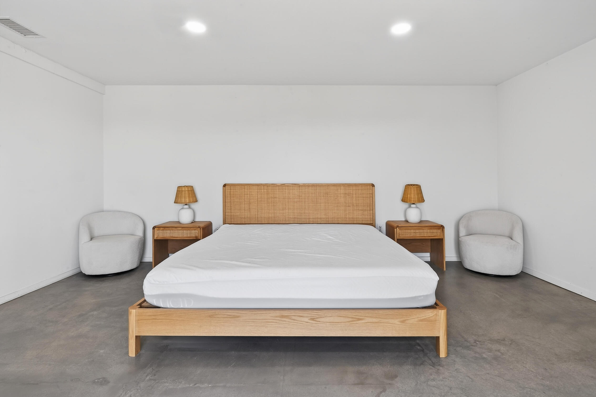 2071 Border Avenue Joshua Tree, CA 92252 - Photo 33 of 50 a bedroom with bed and a couch