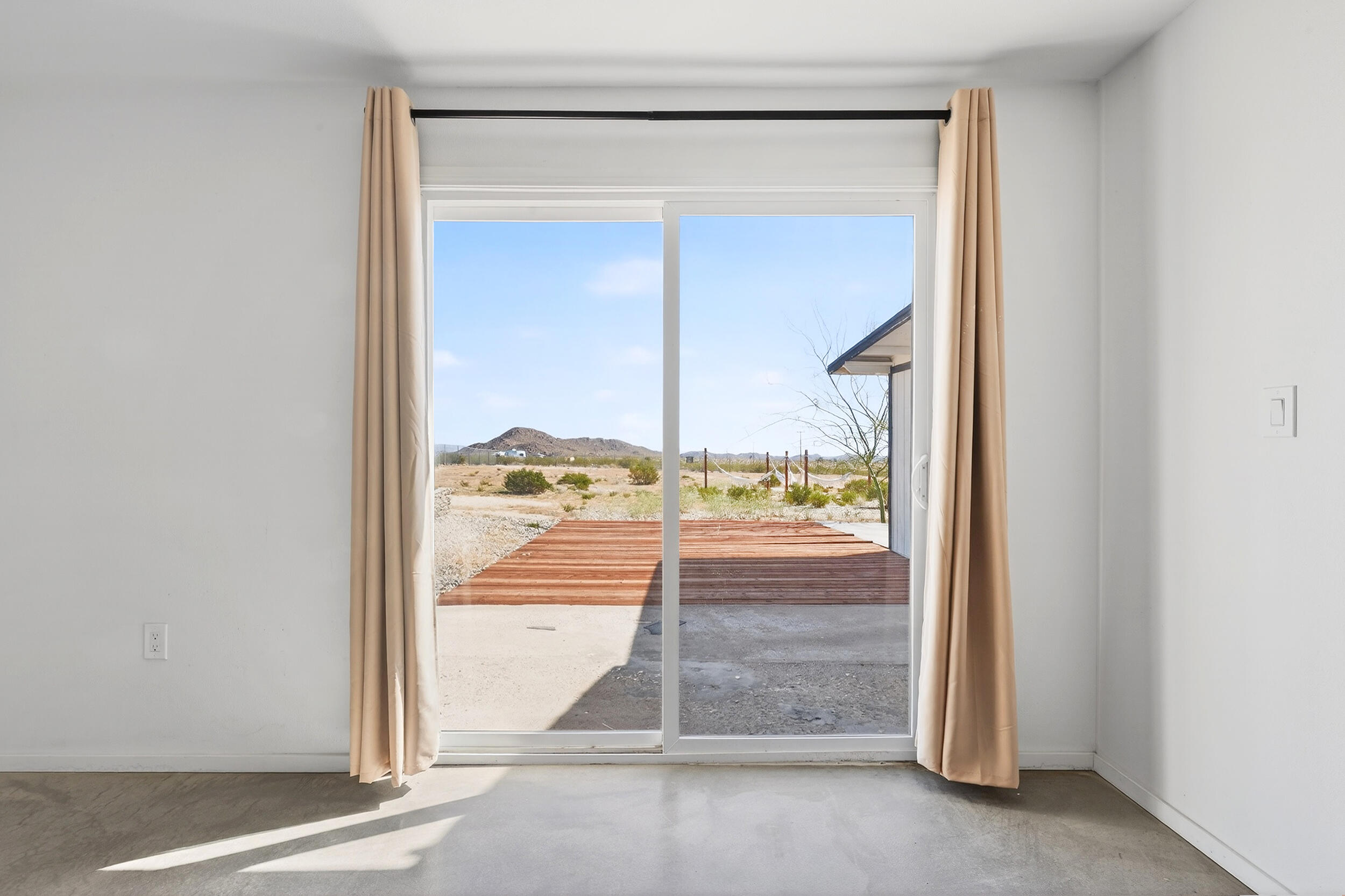 2071 Border Avenue Joshua Tree, CA 92252 - Photo 36 of 50 a view of a room with a large window