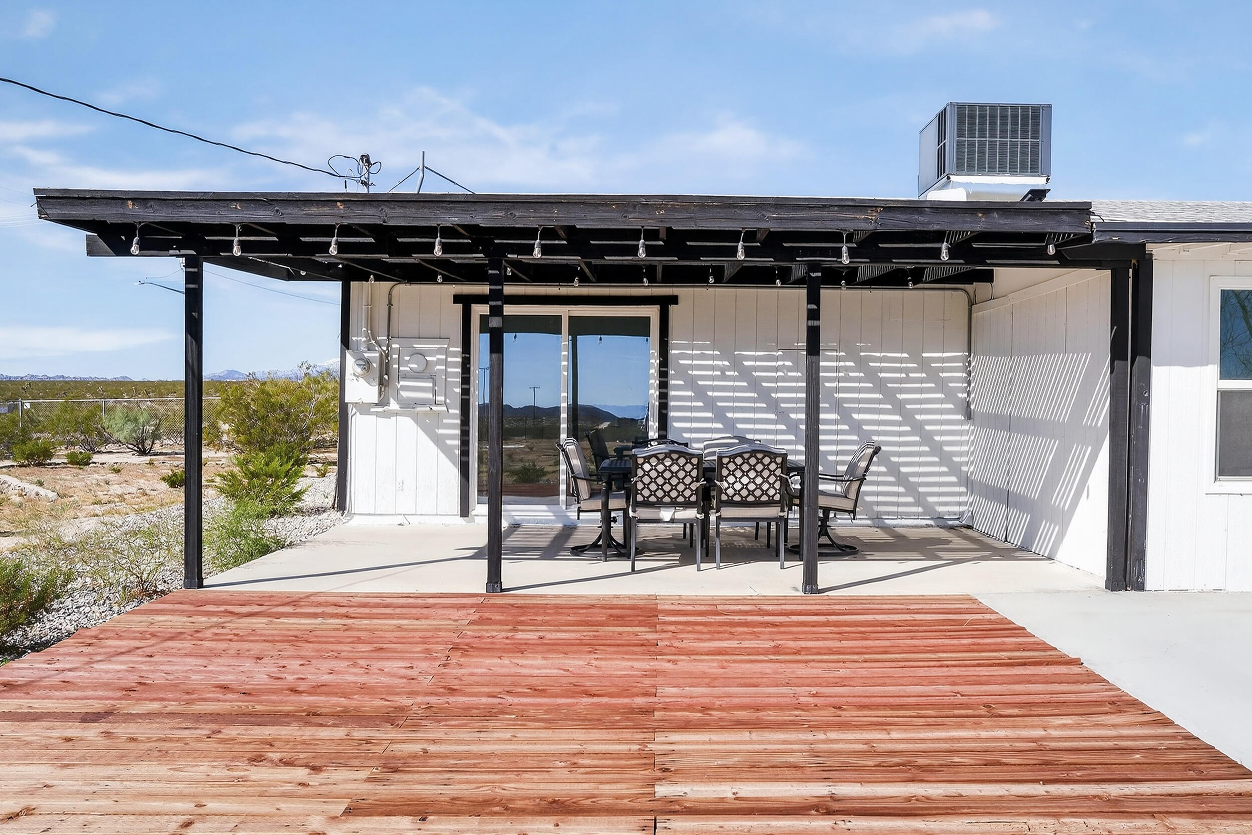 2071 Border Avenue Joshua Tree, CA 92252 - Photo 42 of 50 a view of a terrace with seating space