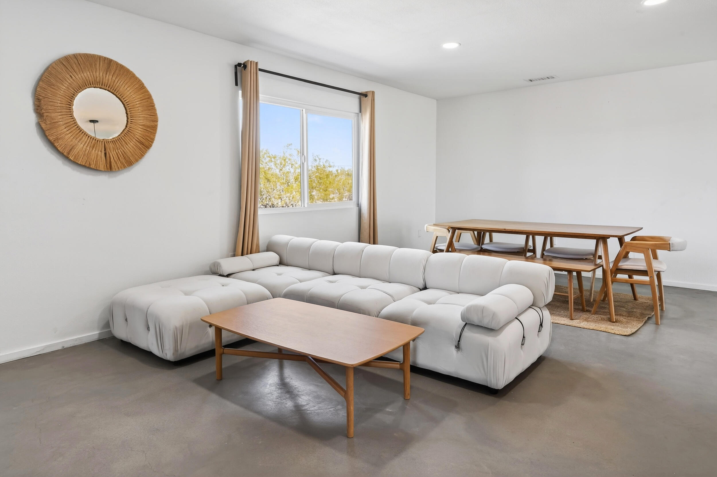 2071 Border Avenue Joshua Tree, CA 92252 - Photo 8 of 50 a living room with furniture and a window