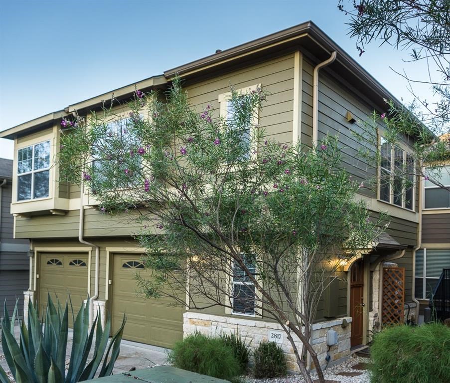 2817 Saville Loop, Unit 22C Austin, TX 78741 - Photo 1 of 1 a view of a house with a yard