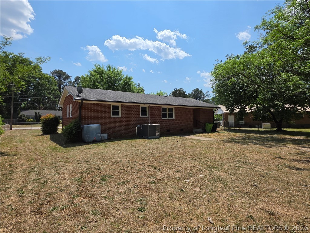 220 Cecil Avenue Spring Lake, NC 28390 - Photo 3 of 21 a house view with a garden space