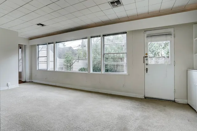 an empty room with windows
