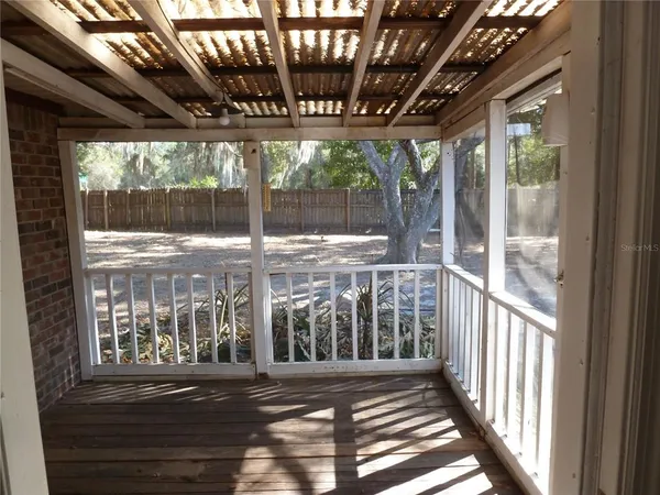 a view of porch with large windows
