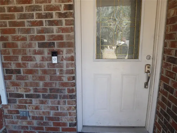 a bathroom with a shower and a window